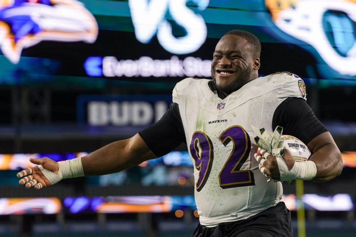 Dec 17, 2023; Jacksonville, Florida, USA;  Baltimore Ravens defensive tackle Justin Madubuike (92) celebrates after beating the Jacksonville Jaguars at EverBank Stadium.
