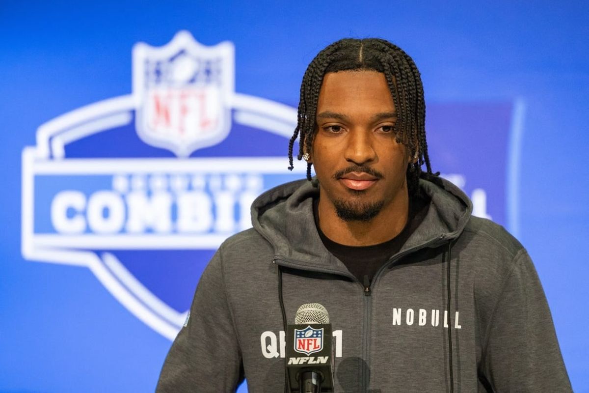 Mar 1, 2024; Indianapolis, IN, USA; Louisiana State quarterback Jayden Daniels (QB01) talks to the media during the 2024 NFL Combine at Lucas Oil Stadium.