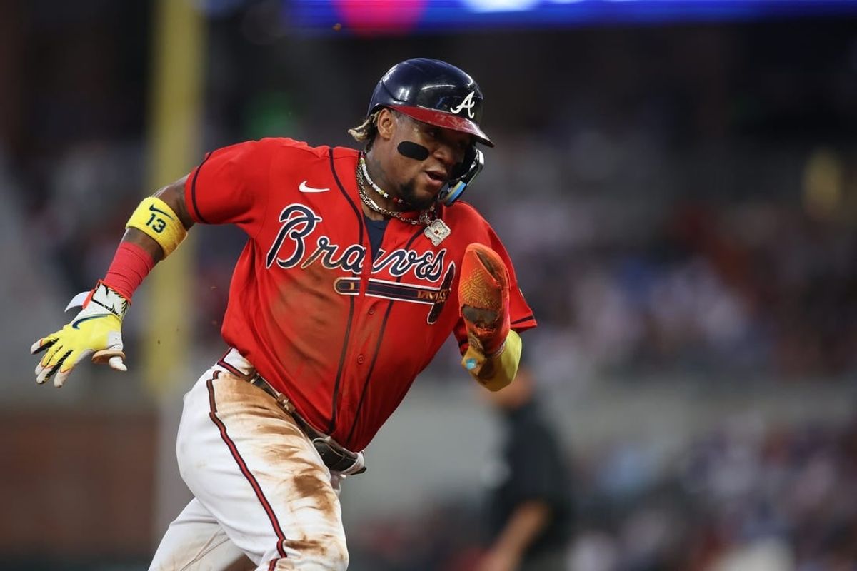 Sep 29, 2023; Atlanta, Georgia, USA; Atlanta Braves right fielder Ronald Acuna Jr. (13) rounds third against the Washington Nationals in the first inning at Truist Park.