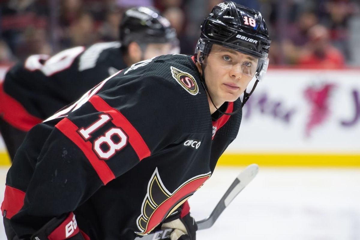 Jan 20, 2024; Ottawa, Ontario, CAN; Ottawa Senators center Tim Stutzle (18) lines up for a faceoff in the second period against the Winnipeg Jets at the Canadian Tire Centre.
