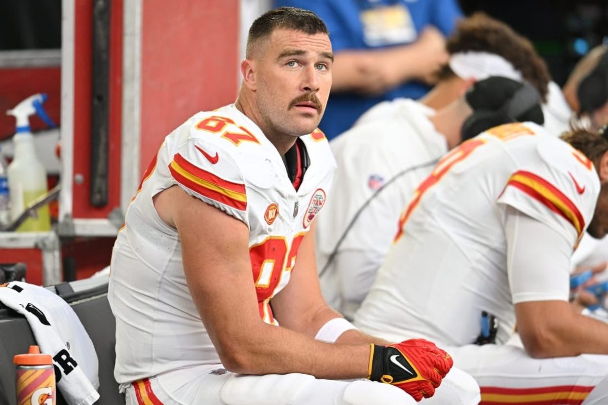 Oct 8, 2023; Minneapolis, Minnesota, USA; Kansas City Chiefs tight end Travis Kelce (87) looks on from the bench against the Minnesota Vikings during the second quarter at U.S. Bank Stadium.
