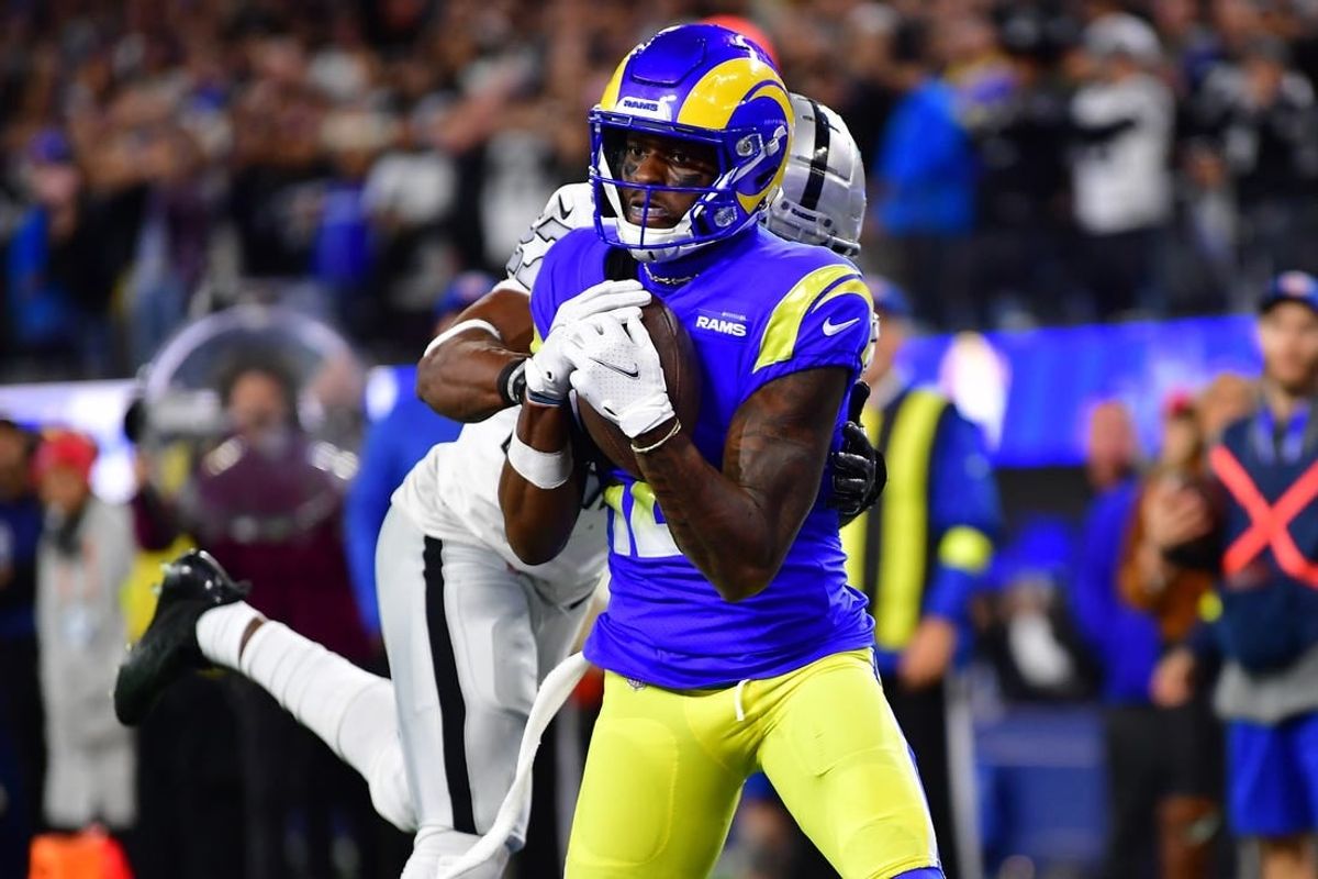 Dec 8, 2022; Inglewood, California, USA; Los Angeles Rams wide receiver Van Jefferson (12) catches a touchdown pass against the defense of Las Vegas Raiders cornerback Sam Webb (27) during the second half at SoFi Stadium.