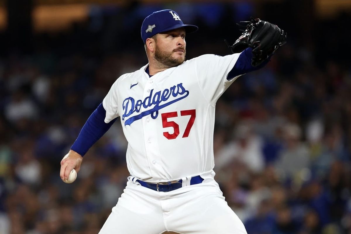 Oct 9, 2023; Los Angeles, California, USA; Los Angeles Dodgers relief pitcher Ryan Brasier (57) throws a pitch against the Arizona Diamondbacks in the fourth inning for game two of the NLDS for the 2023 MLB playoffs at Dodger Stadium.