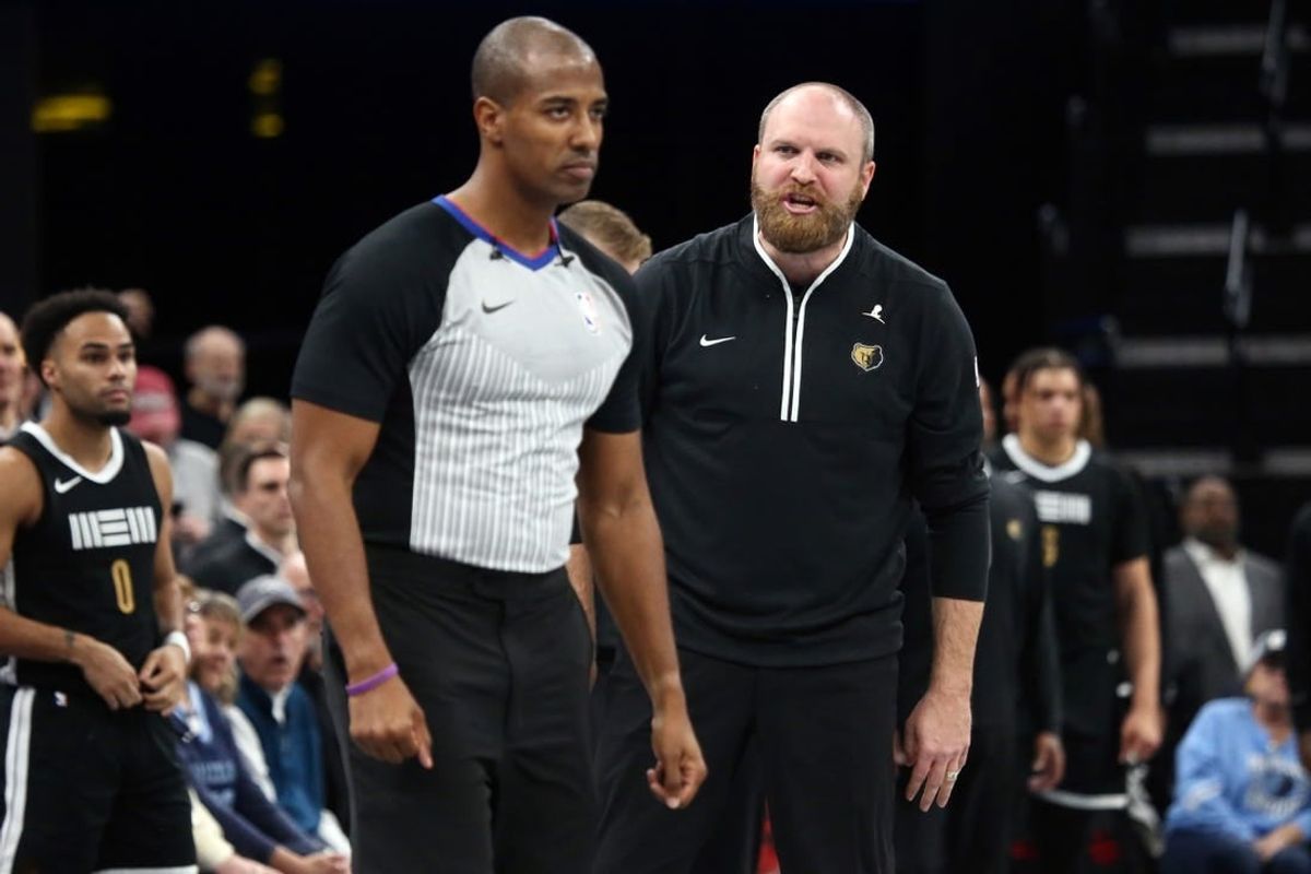 Nov 10, 2023; Memphis, Tennessee, USA; Memphis Grizzlies head coach Taylor Jenkins (right) reacts to a referee after a foul call during the second half against the Utah Jazz at FedExForum.