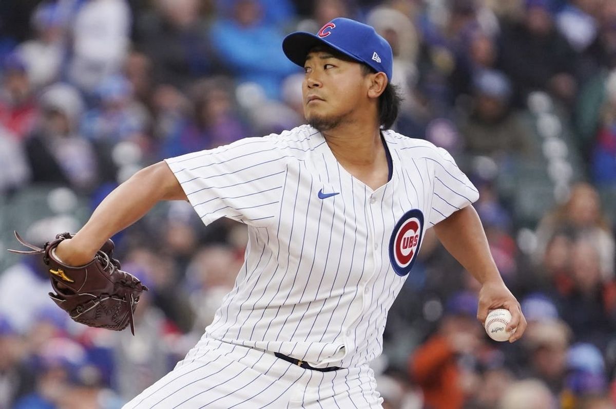 Apr 1, 2024; Chicago, Illinois, USA; Chicago Cubs starting pitcher Shota Imanaga (18) pitches against the Colorado Rockies during the first inning at Wrigley Field.
