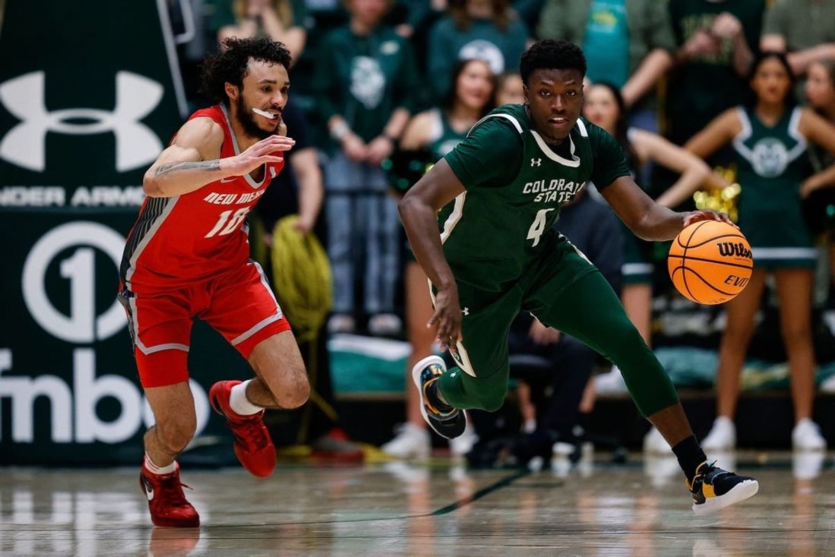 Mar 3, 2023; Fort Collins, Colorado, USA; Colorado State Rams guard Isaiah Stevens (4) dribbles the ball up court against New Mexico Lobos guard Jaelen House (10) in the second half at Moby Arena.