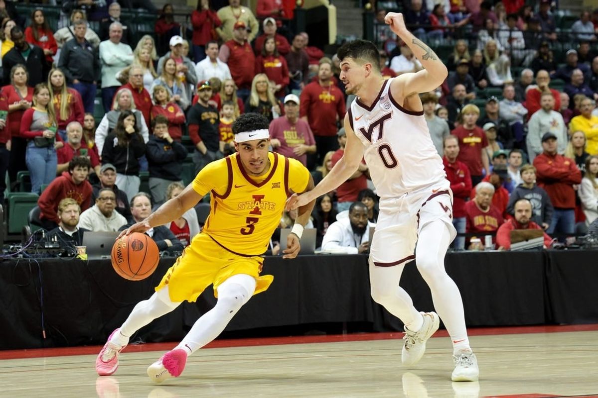 Nov 24, 2023; Kissimmee, FL, USA;  Iowa State Cyclones guard Tamin Lipsey (3) drives to the hoop guarded by Virginia Tech Hokies guard Hunter Cattoor (0) in the second half during the ESPN Events Invitational Semifinal at State Farm Field House.