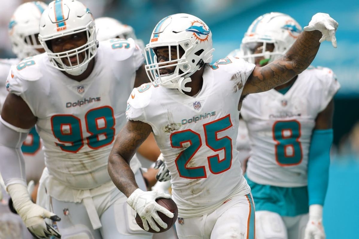 Oct 24, 2021; Miami Gardens, Florida, USA; Miami Dolphins cornerback Xavien Howard (25) celebrates in the end zone with his teammates after intercepting the football against the Atlanta Falcons during the fourth quarter at Hard Rock Stadium.