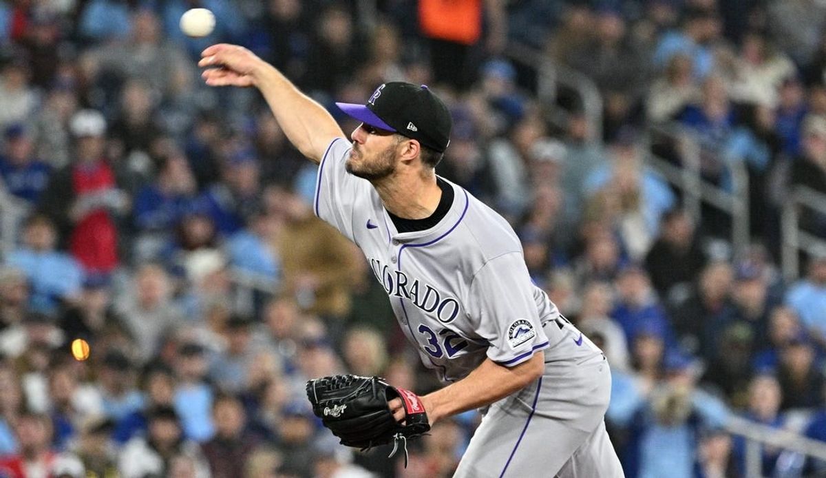 Apr 13, 2024; Toronto, Ontario, CAN;  Colorado Rockies starting pitcher Dakota Hudson (32) delivers a pitch against the Toronto Blue Jays in the fifth inning at Rogers Centre.