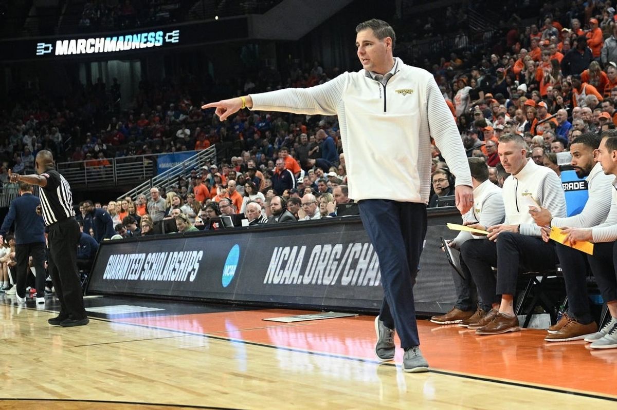 Mar 21, 2024; Omaha, NE, USA; Morehead State Eagles head coach Preston Spradlin directs his team in the second half against the Illinois Fighting Illini during the first round of the NCAA Tournament at CHI Health Center Omaha.