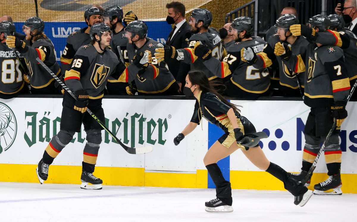 A member of the Knights Crew skates off to pick up ANOTHER hat.