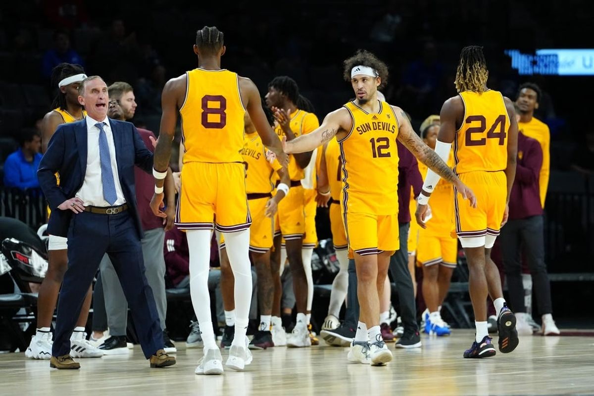 Nov 24, 2023; Las Vegas, NV, USA; Arizona State Sun Devils guard Jose Perez (12) congratulates Arizona State Sun Devils forward Alonzo Gaffney (8) after the Sun Devils defeated the Vanderbilt Commodores 82-67 at Michelob ULTRA Arena.
