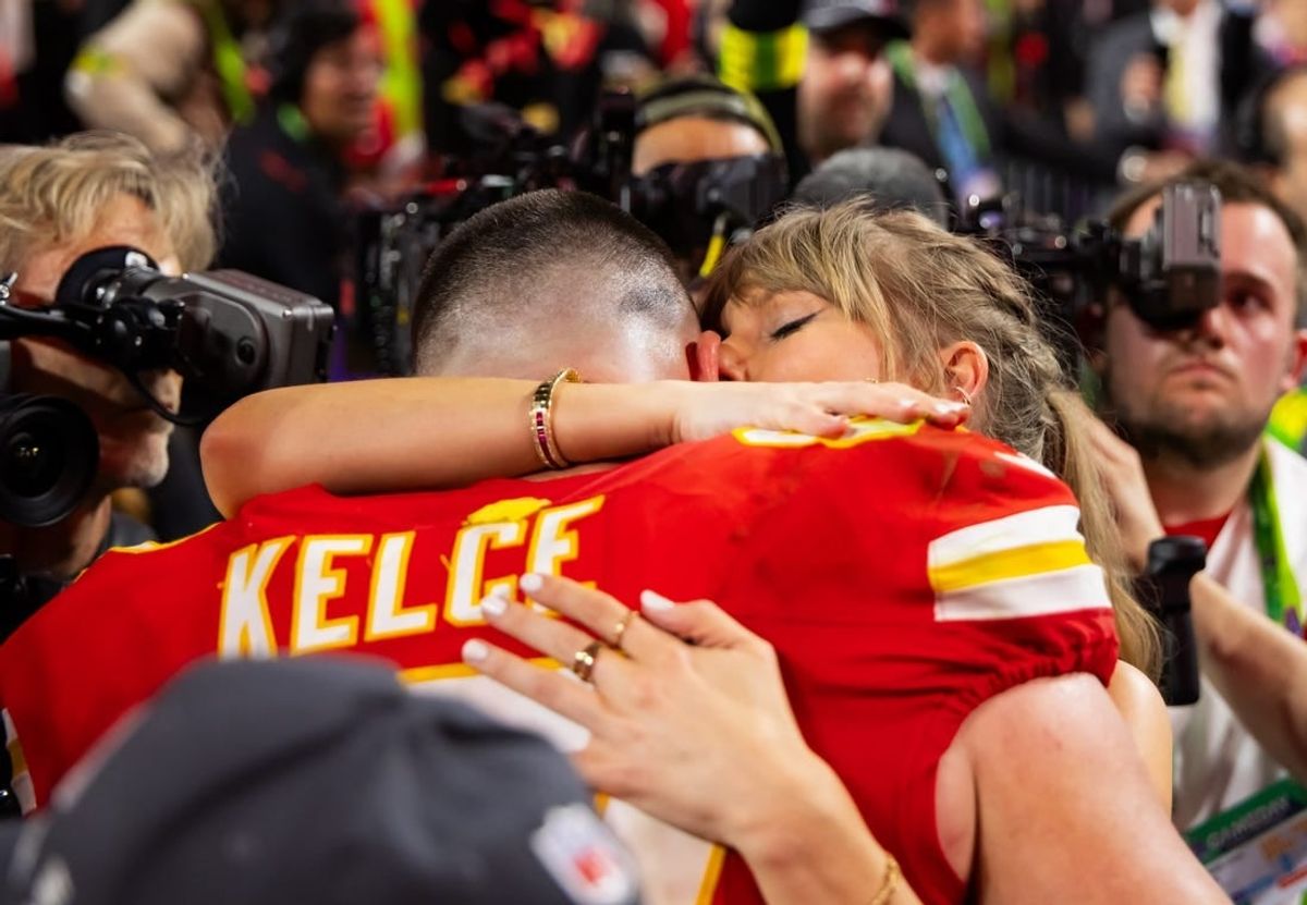 Feb 11, 2024; Paradise, Nevada, USA; Kansas City Chiefs tight end Travis Kelce (87) celebrates with girlfriend Taylor Swift after defeating the San Francisco 49ers in Super Bowl LVIII at Allegiant Stadium.