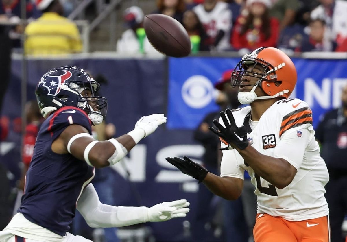 Dec 24, 2023; Houston, Texas, USA; Cleveland Browns wide receiver Amari Cooper (2) catches the ball against Houston Texans safety Jimmie Ward (1) in the first quarter at NRG Stadium.