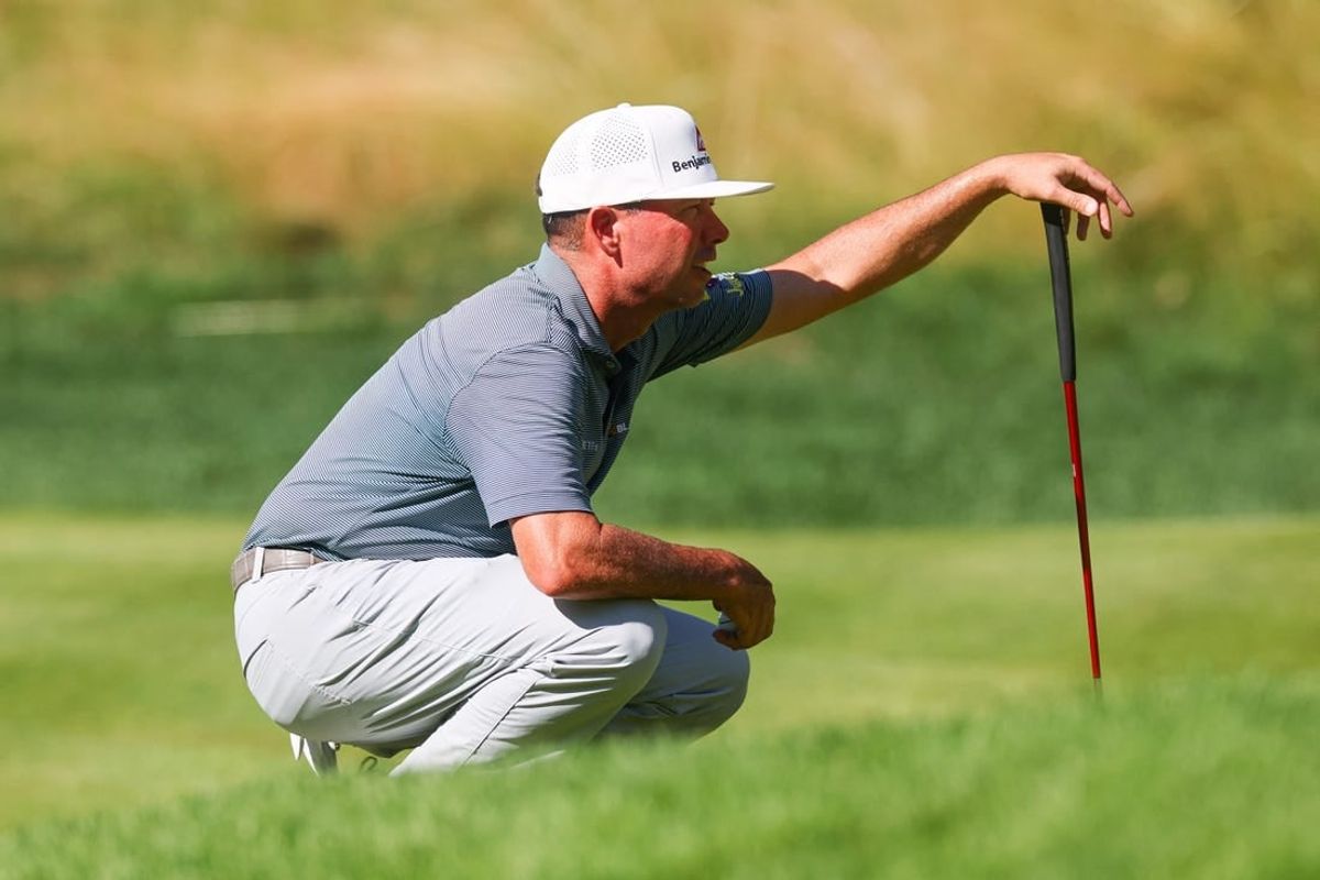 Jun 25, 2023; Cromwell, Connecticut, USA; Chez Reavie reads his putt on the 14th green during the final round of the Travelers Championship golf tournament.