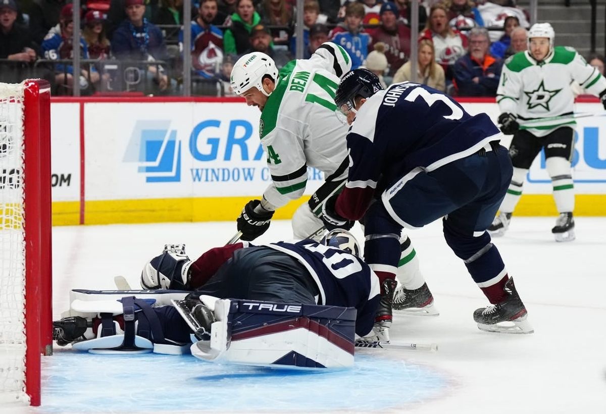 Feb 27, 2024; Denver, Colorado, USA; Dallas Stars left wing Jamie Benn (14) attempts to score on Colorado Avalanche goaltender Alexandar Georgiev (40) and defenseman Jack Johnson (3) in the first period at Ball Arena.