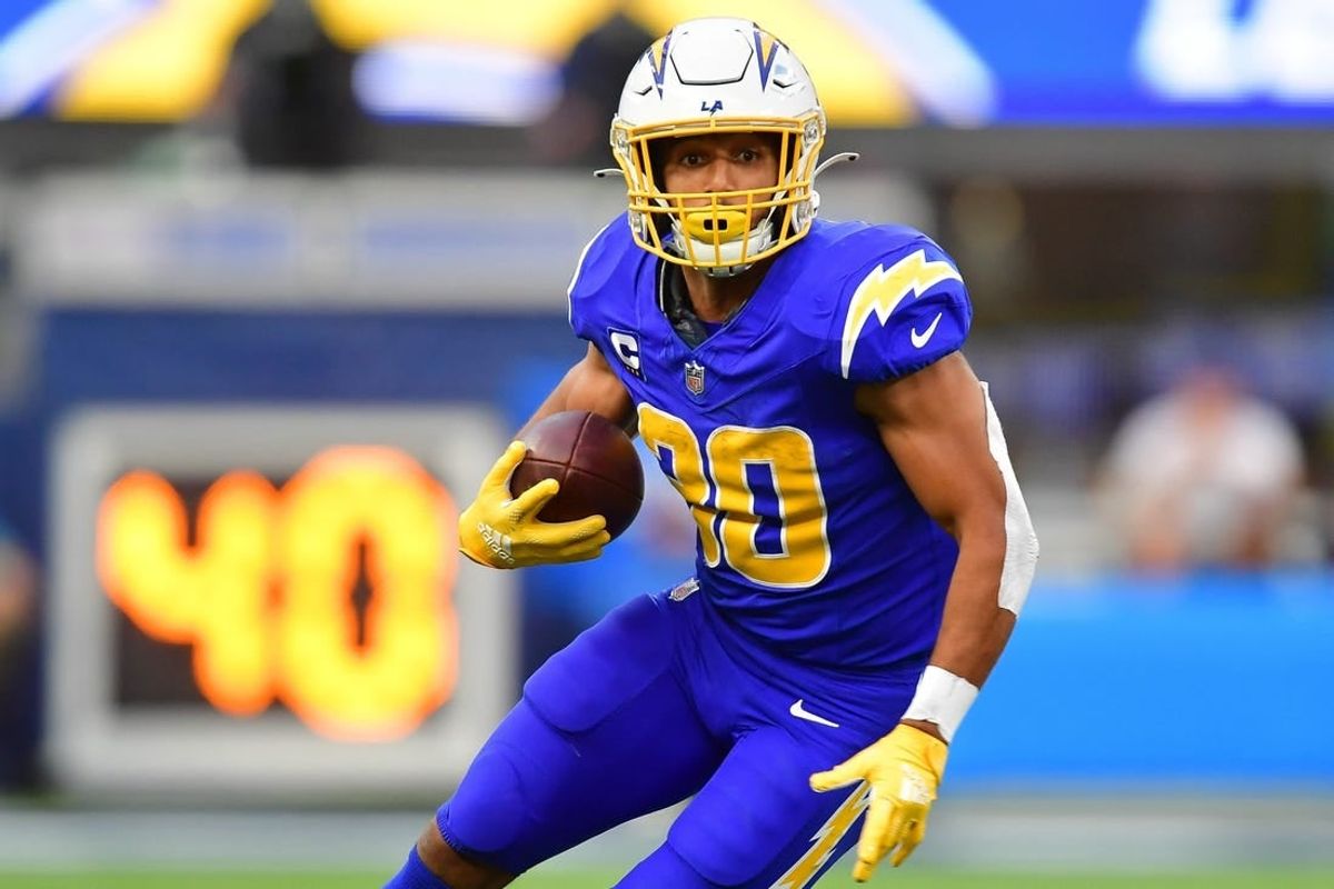 Dec 10, 2023; Inglewood, California, USA; Los Angeles Chargers running back Austin Ekeler (30) runs the ball against the Denver Broncos during the first half at SoFi Stadium.