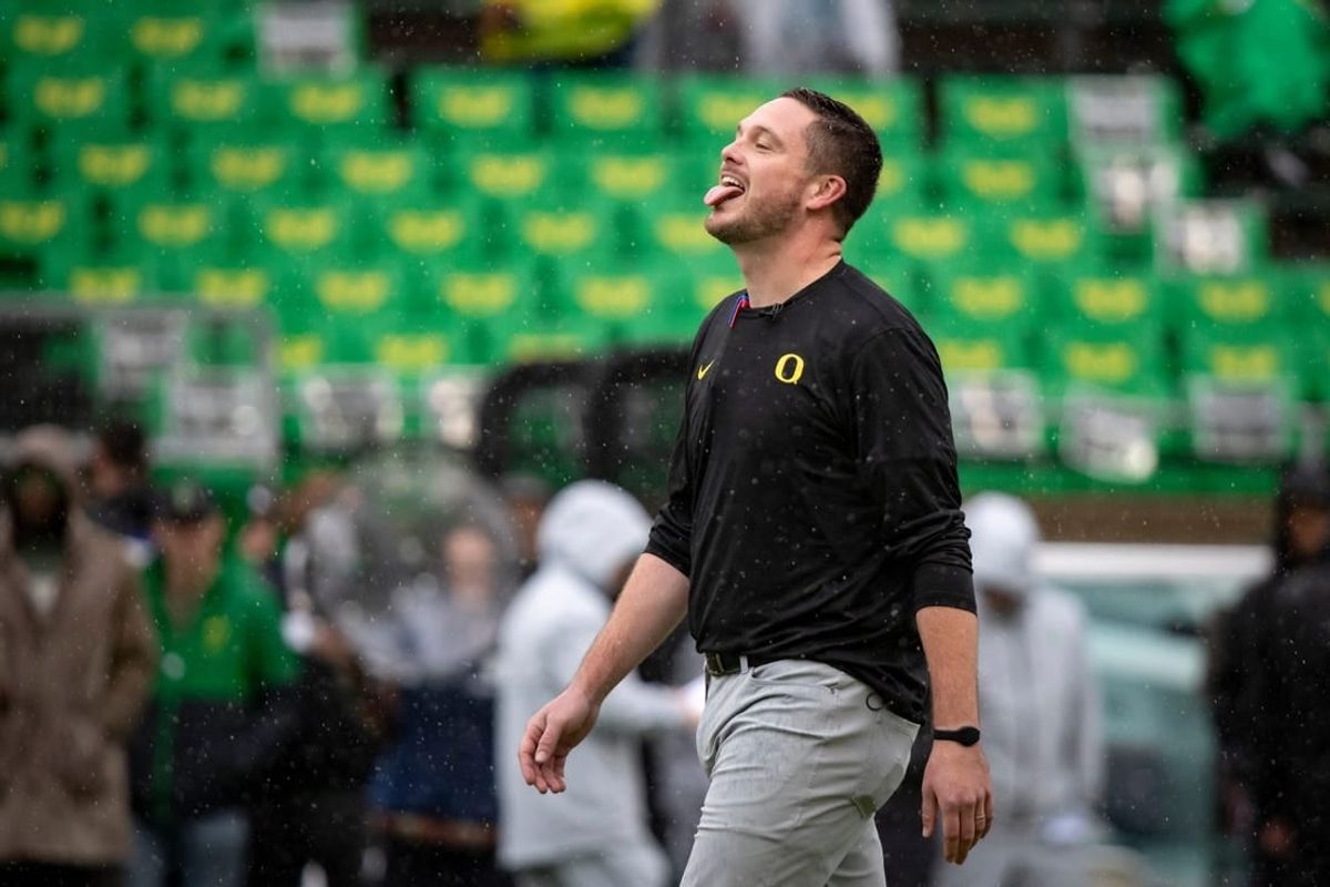Oregon head coach Dan Lanning sticks his tongue out to catch the rain as the No. 6 Oregon Ducks host California Saturday, Nov. 4, 2023, at Autzen Stadium in Eugene, Ore.