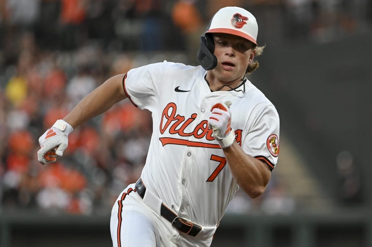Apr 16, 2024; Baltimore, Maryland, USA;  Baltimore Orioles second baseman Jackson Holliday (7) rounds third base to score on shortstop Gunnar Henderson (not pictured) third inning single against the Minnesota Twins at Oriole Park at Camden Yards.
