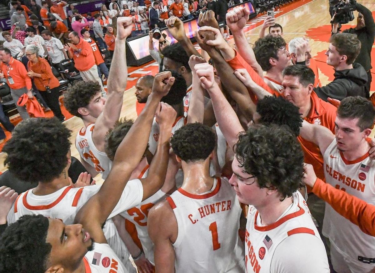 Feb 14, 2024; Clemson, South Carolina, USA; Clemson celebrates after the game with Miami at Littlejohn Coliseum Wednesday, February 14, 2024.  Chase Hunter led the Tigers with 20 points in their 77-60 win.