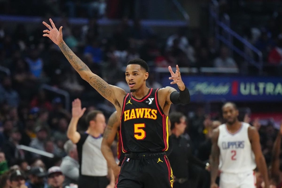 Mar 17, 2024; Los Angeles, California, USA; Atlanta Hawks guard Dejounte Murray (5) celebrates against the LA Clippers in the first half at Crypto.com Arena.