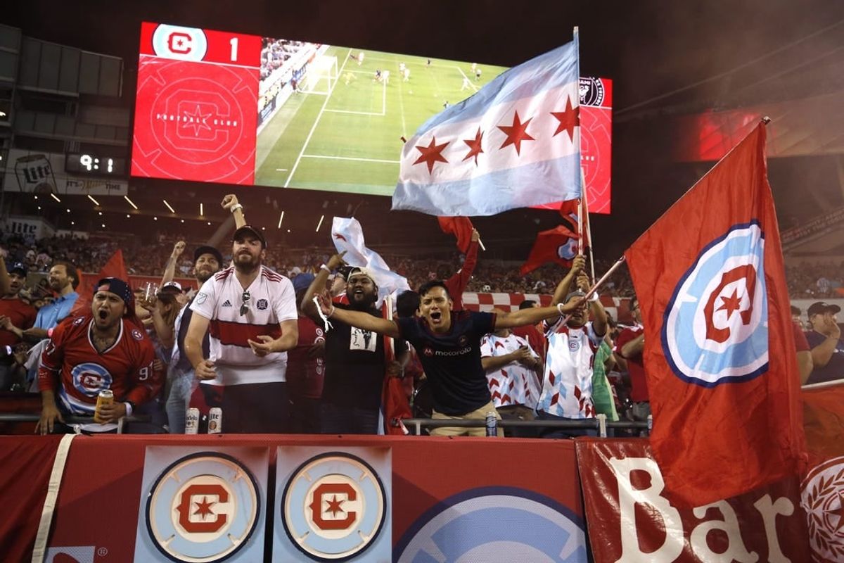Oct 4, 2023; Chicago, Illinois, USA; Chicago Fire fans celebrate in the stands during the second half against the Inter Miami CF at Soldier Field.