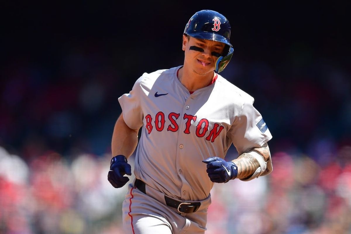 Apr 7, 2024; Anaheim, California, USA; Boston Red Sox left fielder Tyler O'Neill (17) rounds the bases after hitting a solo home run against the Los Angeles Angels during the third inning at Angel Stadium.