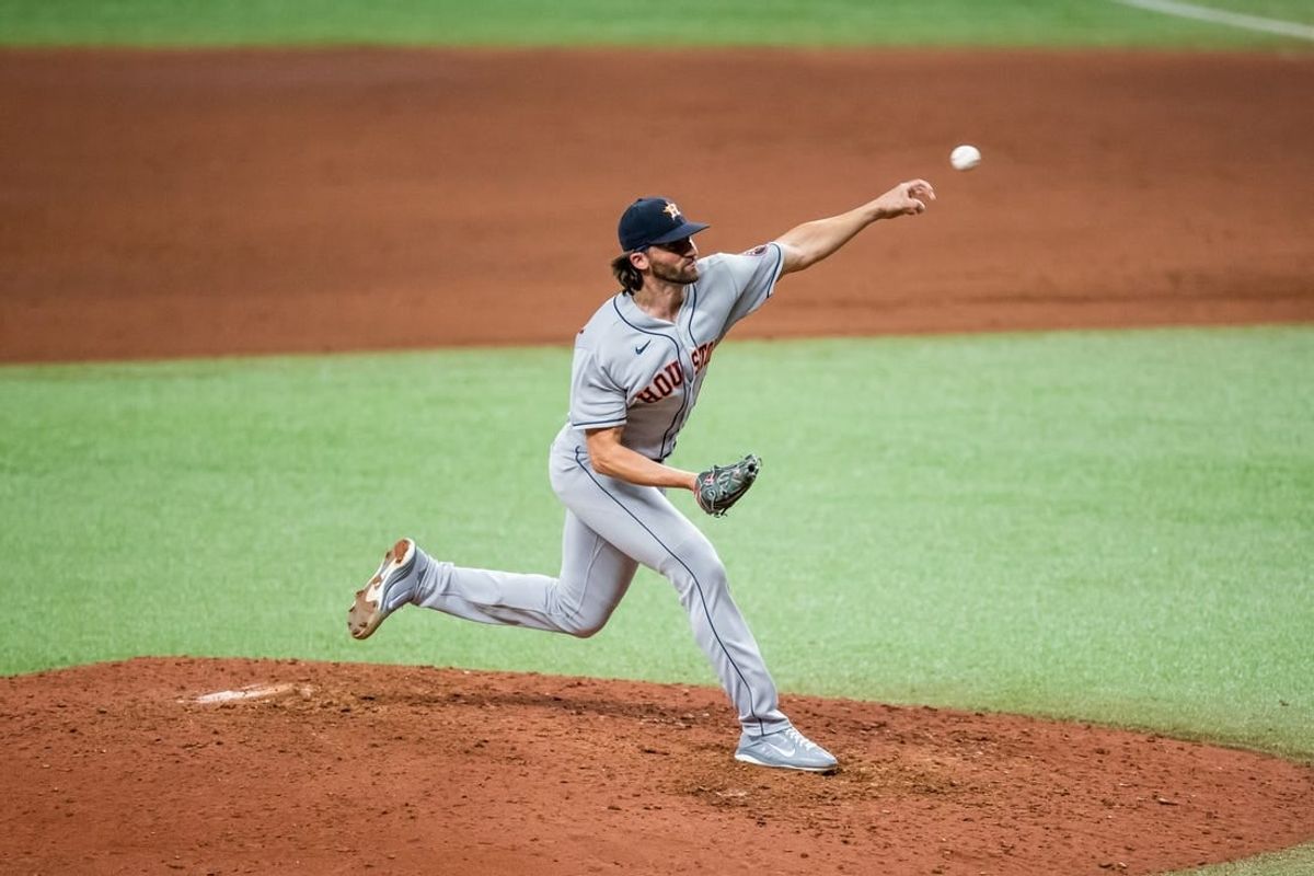 Apr 30, 2021; St. Petersburg, Florida, USA; Houston Astros relief pitcher Kent Emanuel (0) delivers a pitch during the eighth inning of a game against the Tampa Bay Rays at Tropicana Field.