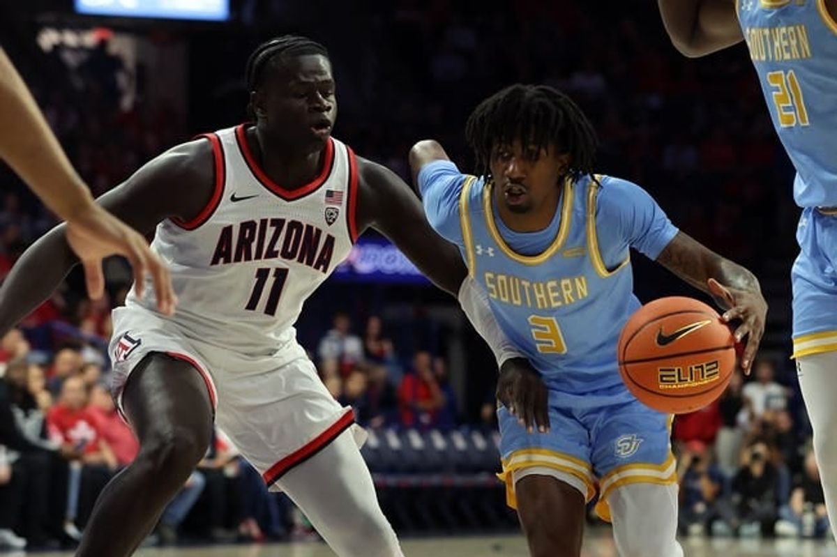 Nov 13, 2023; Tucson, Arizona, USA; Southern University Jaguars guard Tai'Reon Joseph (3) drives to the basket against Arizona Wildcats center Oumar Ballo (11) during the first half at McKale Center.