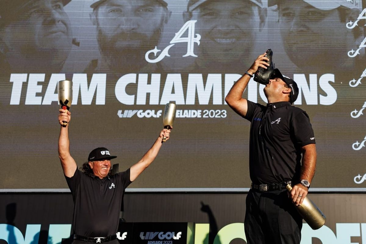 Apr 23, 2023; Adelaide, South Australia, AUS; Team Aces (Pat Perez, Dustin Johnson, Peter Uihlein) celebrate their victory in the team competition, following the final round of LIV Golf Adelaide golf tournament at Grange Golf Club.