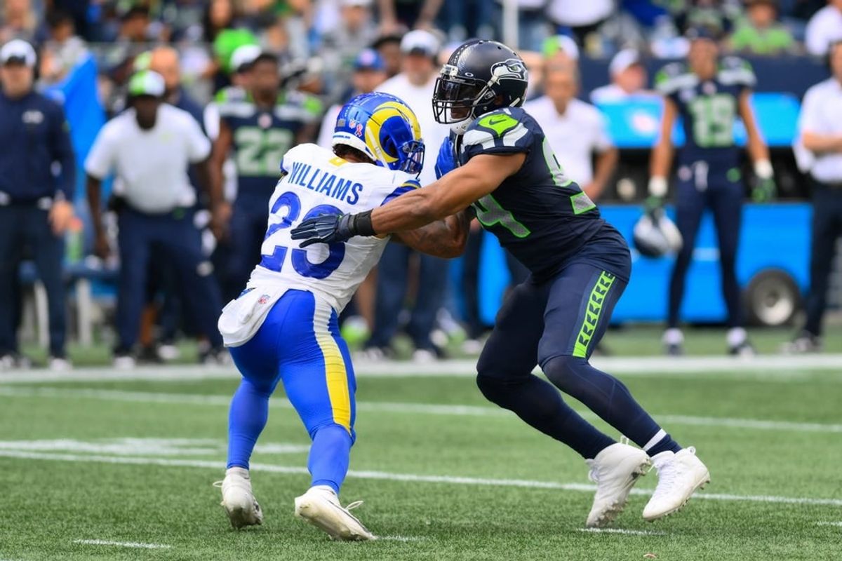 Sep 10, 2023; Seattle, Washington, USA; Los Angeles Rams running back Kyren Williams (23) blocks Seattle Seahawks linebacker Bobby Wagner (54) during the second half at Lumen Field.