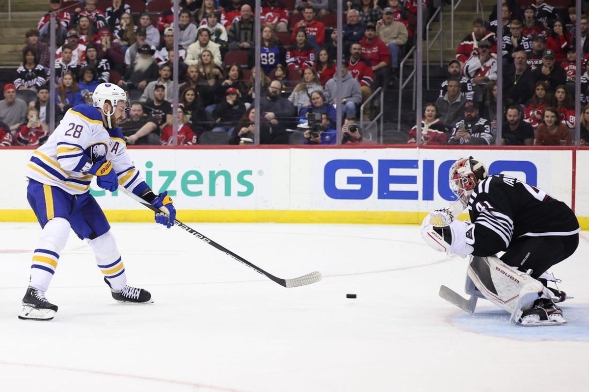 Oct 27, 2023; Newark, New Jersey, USA; New Jersey Devils goaltender Vitek Vanecek (41) makes a save against Buffalo Sabres left wing Zemgus Girgensons (28) during the second period at Prudential Center.