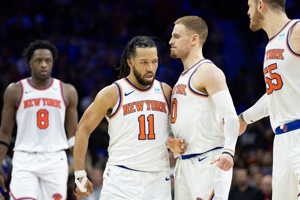 May 2, 2024; Philadelphia, Pennsylvania, USA; New York Knicks guard Jalen Brunson (11) reacts with guard Donte DiVincenzo (0).