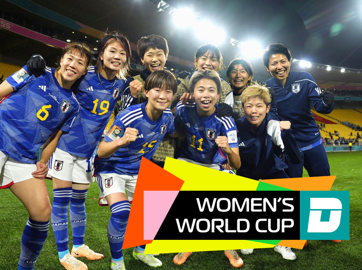 Japan celebrates  after a 4-0 trouncing of Spain.
