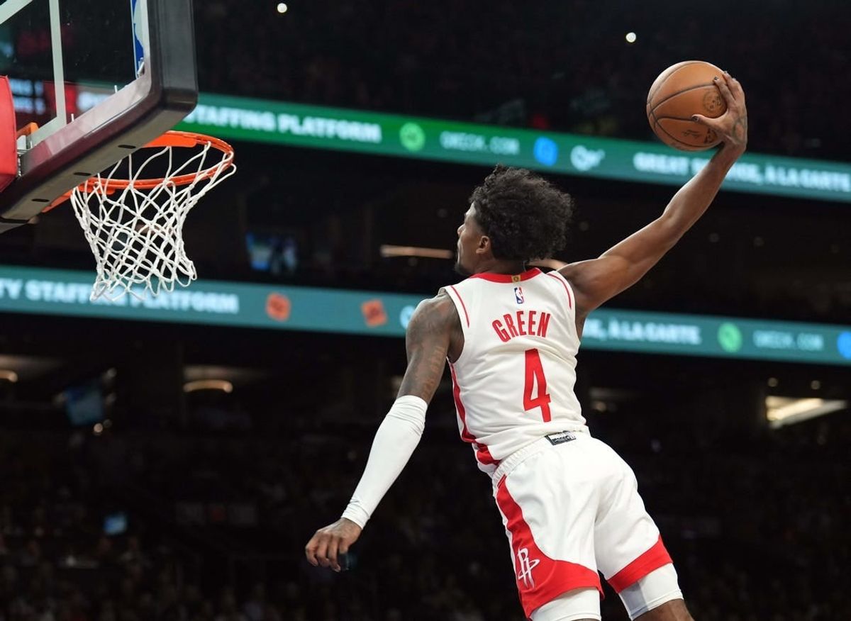 Feb 29, 2024; Phoenix, Arizona, USA; Houston Rockets guard Jalen Green (4) dunks against the Phoenix Suns during the first half at Footprint Center.