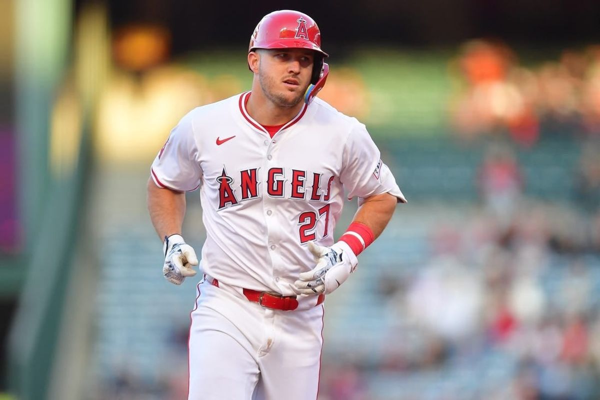 Apr 23, 2024; Anaheim, California, USA; Los Angeles Angels center fielder Mike Trout (27) rounds the bases after hitting a solo home run against the Baltimore Orioles during the first inning at Angel Stadium.