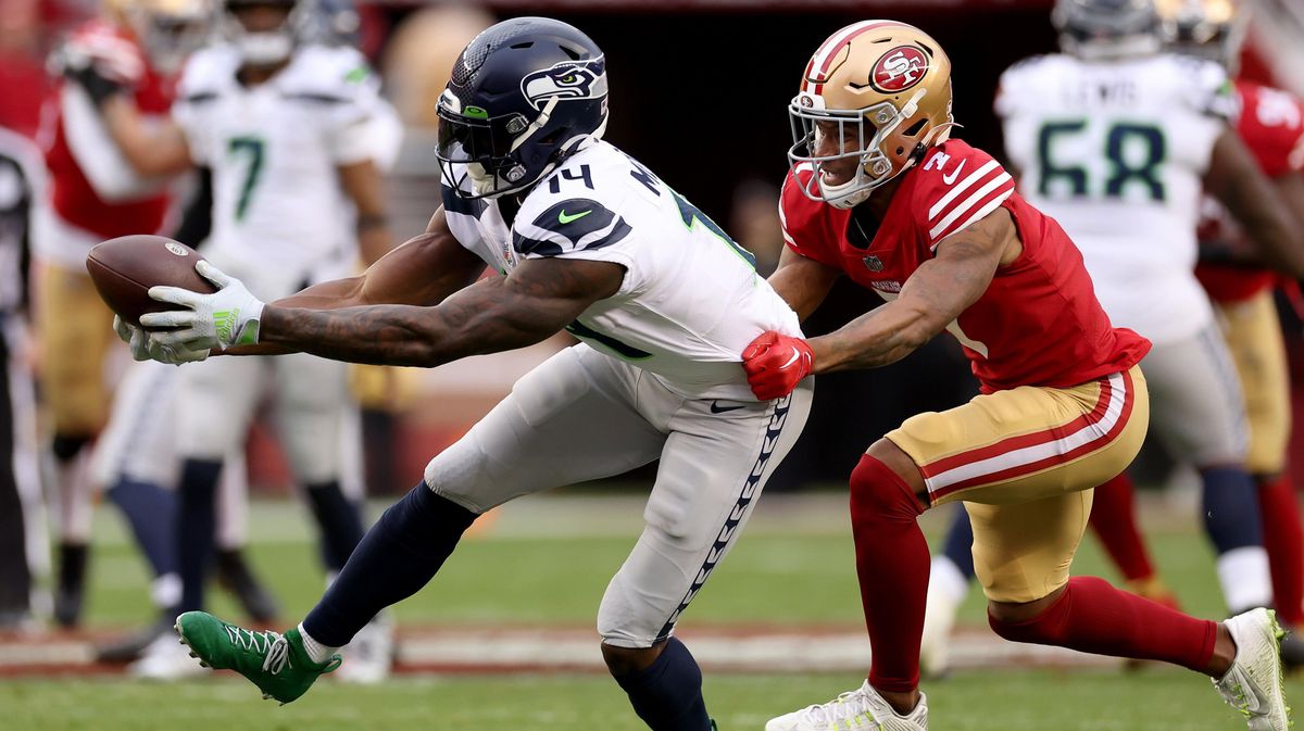 Seattle’s DK Metcalf bobbles a catch against Charvarius Ward during the third quarter in the NFC Wild Card playoff game at Levi’s Stadium on Jan.  14, 2023,  in Santa Clara, California.