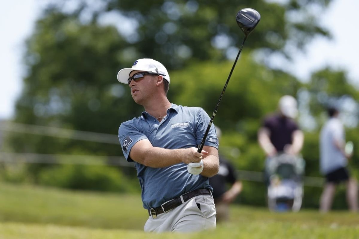 May 27, 2023; Potomac Falls, Virginia, USA; Andy Ogletree hits his tee shot on the second hole during the second round of LIV Golf Washington, D.C. golf tournament at Trump National.