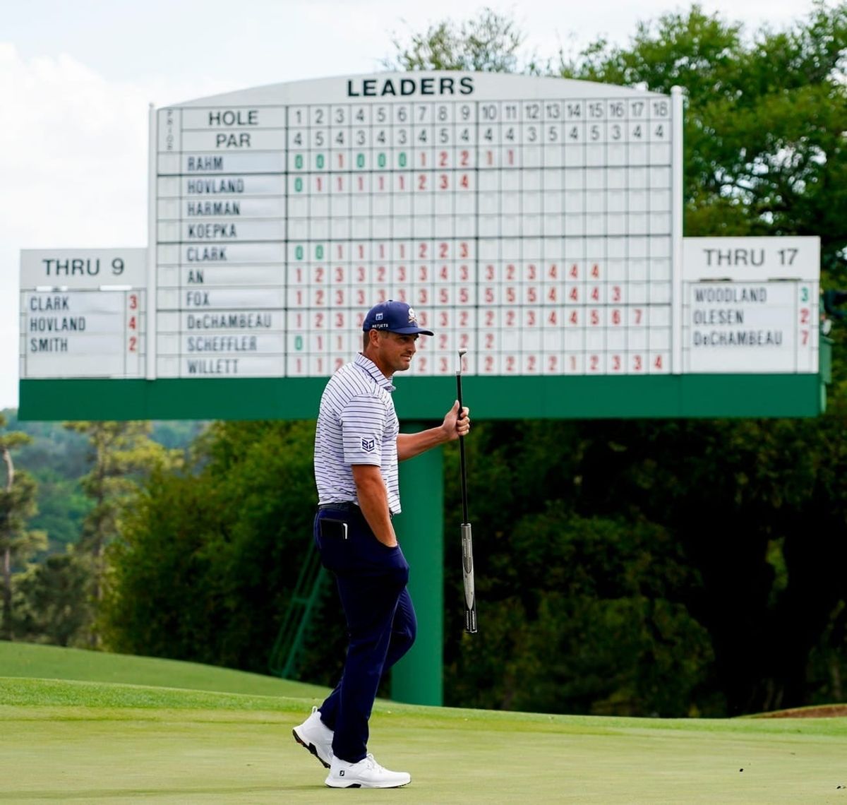 Apr 11, 2024; Augusta, Georgia, USA; Bryson DeChambeau walks the no. 18 green during the first round of the Masters Tournament.