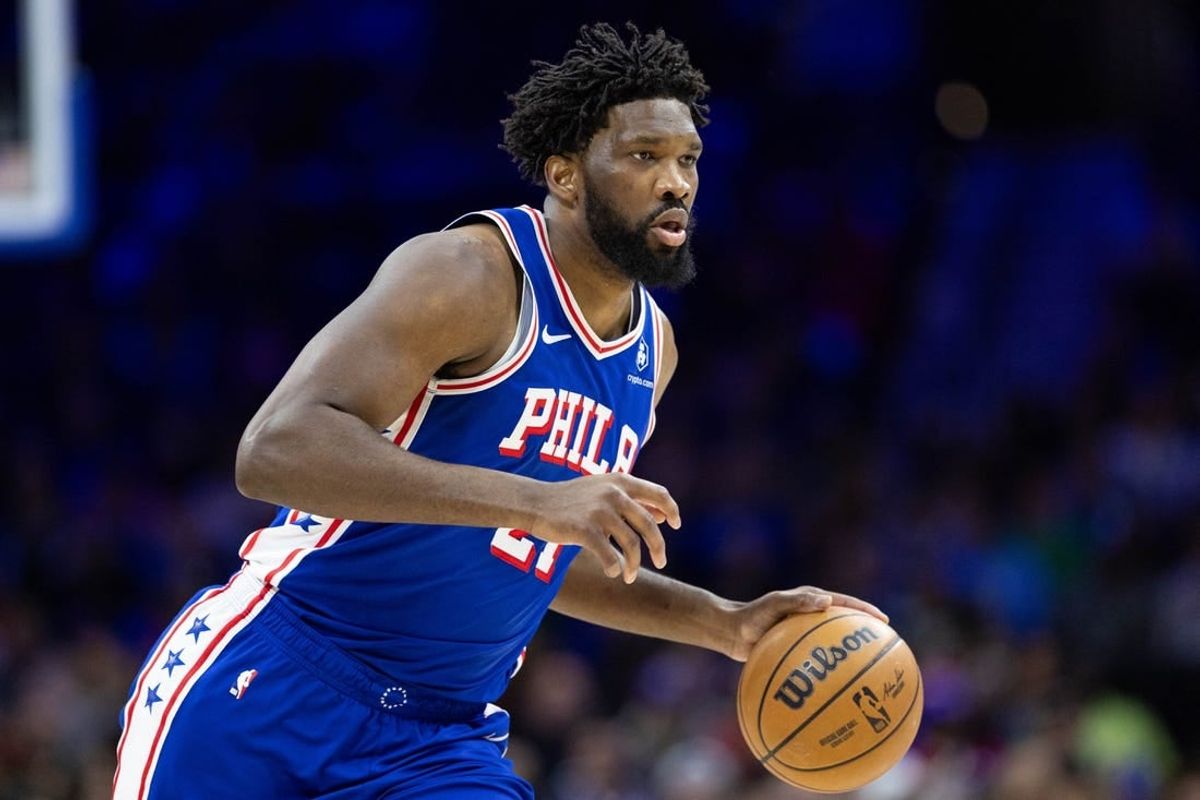 Jan 15, 2024; Philadelphia, Pennsylvania, USA; Philadelphia 76ers center Joel Embiid (21) dribbles the ball against the Houston Rockets during the first quarter at Wells Fargo Center.