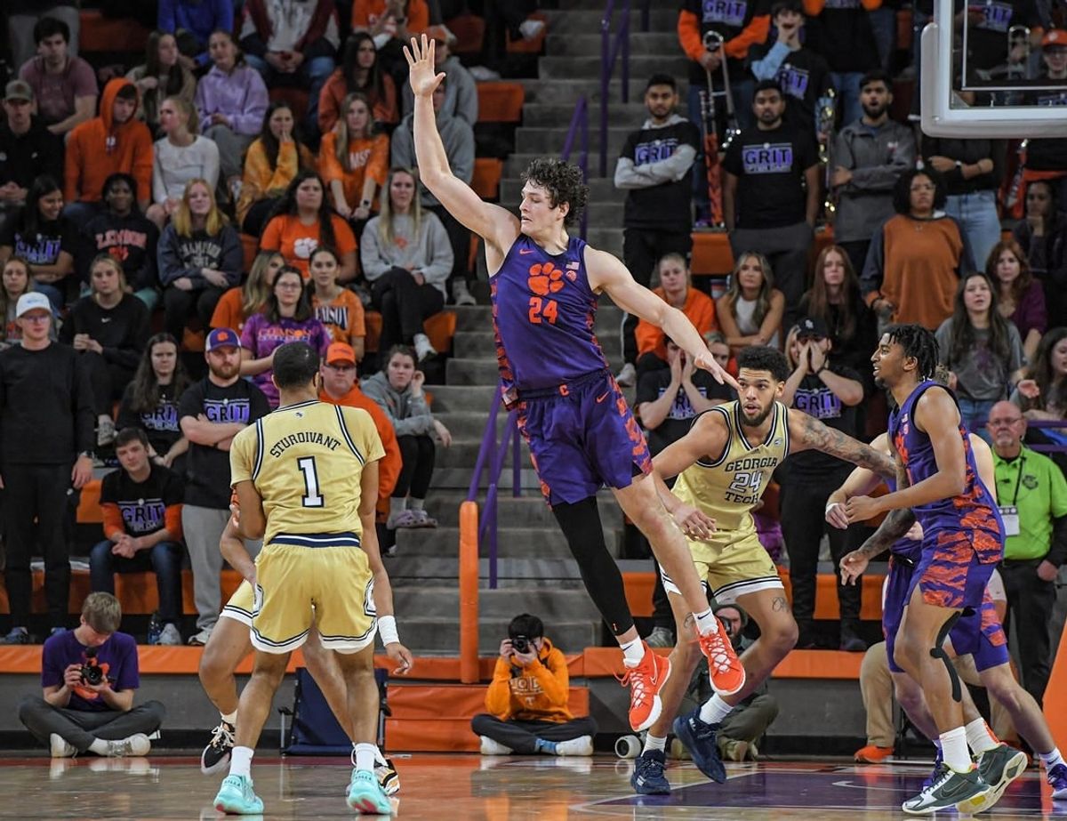 Jan 24, 2023; Clemson, South Carolina, USA; Clemson Tigers center PJ Hall (24) defends against Georgia Tech Yellow Jackets guard Kyle Sturdivant (1) during the second half at Littlejohn Coliseum.