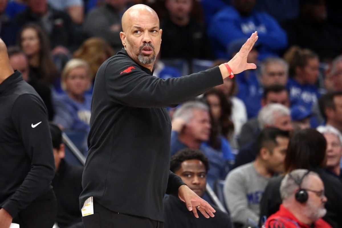 Jan 7, 2024; Memphis, Tennessee, USA; Southern Methodist Mustangs head coach Rob Lanier reacts during the first half against the Memphis Tigers at FedExForum.