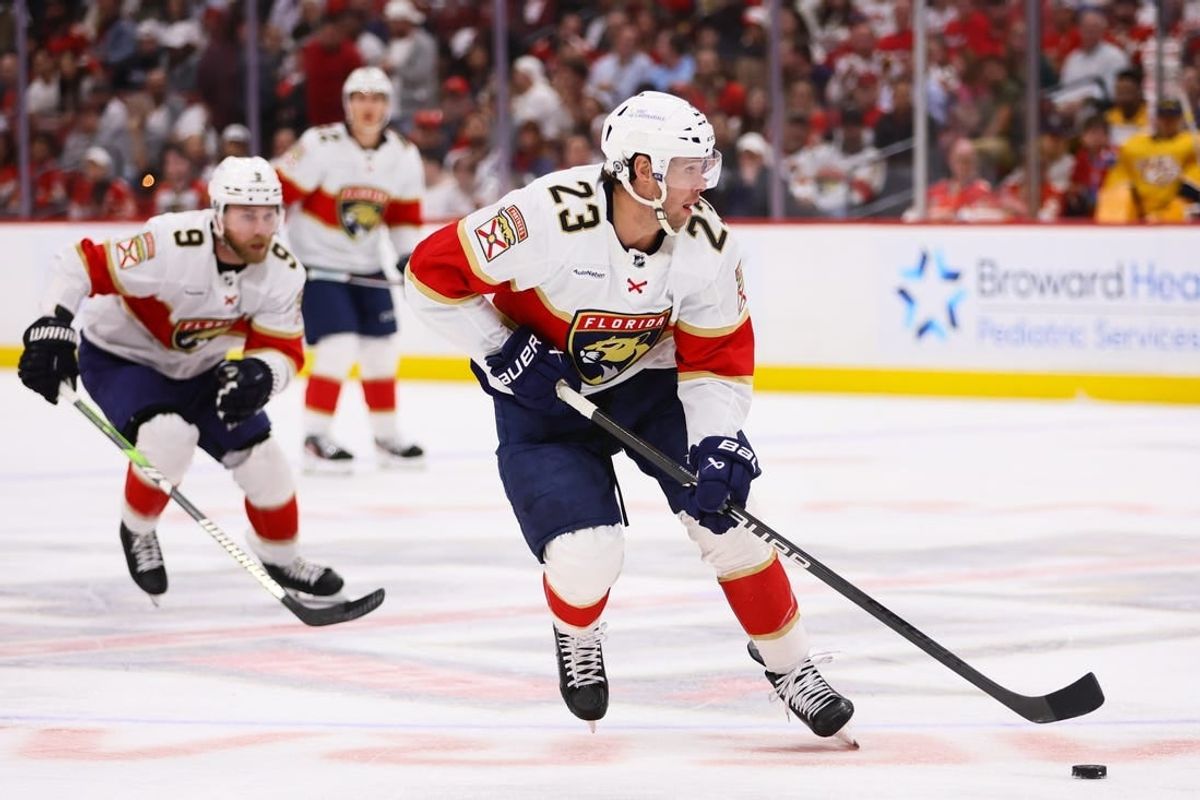 Mar 21, 2024; Sunrise, Florida, USA; Florida Panthers center Carter Verhaeghe (23) moves the puck against the Nashville Predators during the second period at Amerant Bank Arena.