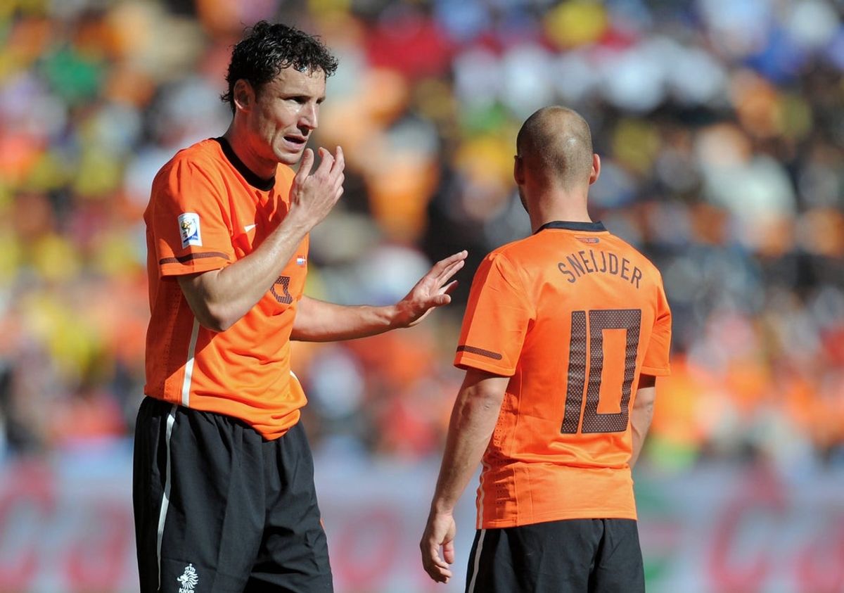 Deadspin | Belgium hire coach Mark van Bommel to replace Rudi Garcia June 14, 2010; Johannesburg, SOUTH AFRICA; Netherlands midfielder Mark van Bommel (6) talks with midfielder Wesley Sneijder (10) during Group E play against Denmark in the 2010 World Cup at Soccer City Stadium. Mandatory Credit: Tim Groothuis/Witters Sport via Imagn Images Mark van Bommel was named the new head coach of Belgium’s national team. van Bommel will take over on August 15 and lead the team through the 2028 European Championship, joined by assistant coaches Boudewijn Zenden, Maarten Martens and Reinier Robbemond, per a Belgium statement released Friday. The 49-year-old replaces Rudi Garcia, who departed the role this week at the end of his 18-month contract, having led Belgium to the 2026 World Cup quarterfinals, where they were knocked out by eventual winner Spain. The loss ended an unbeaten run of 18 matches stretching back to a 3-1 loss to Ukraine in March 2025. A former Bayern Munich and Barcelona midfielder, Van Bommel has been out of a head coaching spot since 2023-24, his second season at the helm of Belgian club Royal Antwerp. In his debut campaign, he led the club to its first league title in 66 years. van Bommel also had coaching stints at VfL Wolfsburg (2021) and PSV Eindhoven (2018-19). He also served in assistant coaching positions for Saudia Arabia (2015-17) and Australia (2018). “Belgium has outstanding players and enormous potential. Together with my coaching staff, we want to build a team that is disciplined, ambitious and brave enough to compete with the very best,” Van Bommel said. The Dutch native takes over a Belgium side currently ranked eighth in FIFA’s world rankings. He will be asked to end Belgium’s disappointing run of early exits at the next European Championships, where they have not progressed beyond the quarterfinals since the 1996 expansion. In the two most recent tournaments, the team has lost in the round of 16 and the quarterfinals. “Success is never guaranteed, but hard work, honesty and commitment are,” Van Bommell said.” We will give everything to help this team improve every day and make the Belgian people proud. I am looking forward to meeting the players, the staff and the supporters, and beginning this new chapter together.” –Field Level Media #Deadspin #Belgium #hire #coach #Mark #van #Bommel #replace #Rudi #Garcia Deadspin | Belgium hire coach Mark van Bommel to replace Rudi Garcia June 14, 2010; Johannesburg, SOUTH AFRICA; Netherlands midfielder Mark van Bommel (6) talks with midfielder Wesley Sneijder (10) during Group E play against Denmark in the 2010 World Cup at Soccer City Stadium. Mandatory Credit: Tim Groothuis/Witters Sport via Imagn Images Mark van Bommel was named the new head coach of Belgium’s national team. van Bommel will take over on August 15 and lead the team through the 2028 European Championship, joined by assistant coaches Boudewijn Zenden, Maarten Martens and Reinier Robbemond, per a Belgium statement released Friday. The 49-year-old replaces Rudi Garcia, who departed the role this week at the end of his 18-month contract, having led Belgium to the 2026 World Cup quarterfinals, where they were knocked out by eventual winner Spain. The loss ended an unbeaten run of 18 matches stretching back to a 3-1 loss to Ukraine in March 2025. A former Bayern Munich and Barcelona midfielder, Van Bommel has been out of a head coaching spot since 2023-24, his second season at the helm of Belgian club Royal Antwerp. In his debut campaign, he led the club to its first league title in 66 years. van Bommel also had coaching stints at VfL Wolfsburg (2021) and PSV Eindhoven (2018-19). He also served in assistant coaching positions for Saudia Arabia (2015-17) and Australia (2018). “Belgium has outstanding players and enormous potential. Together with my coaching staff, we want to build a team that is disciplined, ambitious and brave enough to compete with the very best,” Van Bommel said. The Dutch native takes over a Belgium side currently ranked eighth in FIFA’s world rankings. He will be asked to end Belgium’s disappointing run of early exits at the next European Championships, where they have not progressed beyond the quarterfinals since the 1996 expansion. In the two most recent tournaments, the team has lost in the round of 16 and the quarterfinals. “Success is never guaranteed, but hard work, honesty and commitment are,” Van Bommell said.” We will give everything to help this team improve every day and make the Belgian people proud. I am looking forward to meeting the players, the staff and the supporters, and beginning this new chapter together.” –Field Level Media #Deadspin #Belgium #hire #coach #Mark #van #Bommel #replace #Rudi #Garcia