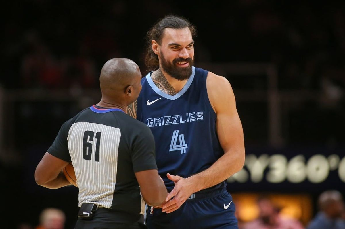 Oct 12, 2023; Atlanta, Georgia, USA; Memphis Grizzlies center Steven Adams (4) talks to referee Courtney Kirkland (61) before a game against the Atlanta Hawks in the first half at State Farm Arena.