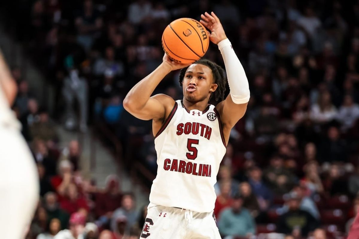 Jan 6, 2024; Columbia, South Carolina, USA; South Carolina Gamecocks guard Meechie Johnson (5) attempts a three point basket \ams in the first half at Colonial Life Arena.