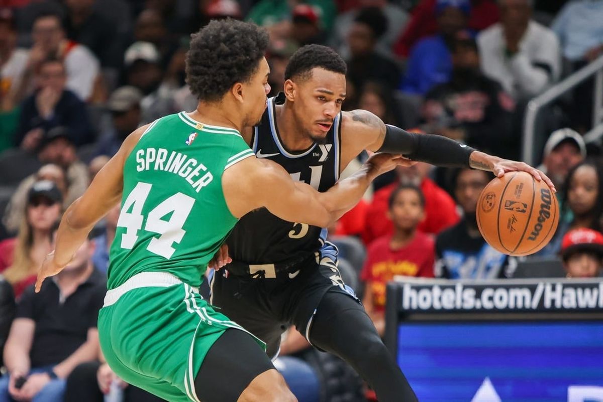 Mar 25, 2024; Atlanta, Georgia, USA; Boston Celtics guard Jaden Springer (44) defends Atlanta Hawks guard Dejounte Murray (5) in the second half at State Farm Arena.