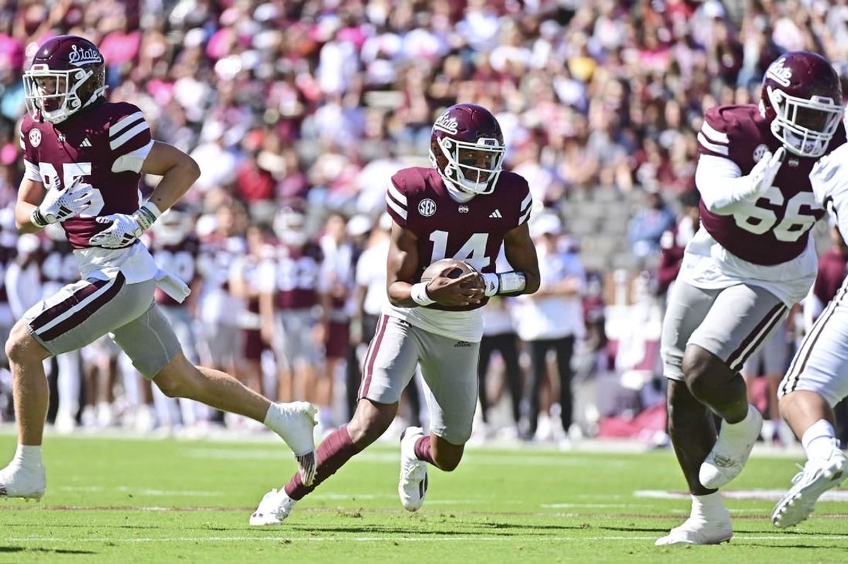 Oct 7, 2023; Starkville, Mississippi, USA; Mississippi State Bulldogs quarterback Mike Wright (14) runs the ball against the Western Michigan Broncos during the first quarter at Davis Wade Stadium at Scott Field.