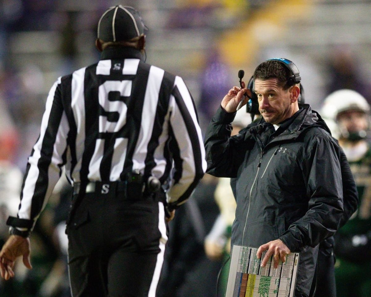Nov 19, 2022; Baton Rouge, Louisiana, USA;  UAB Blazers interim head coach Bryant Vincent  talks to the side judge against the LSU Tigers during the second half at Tiger Stadium.