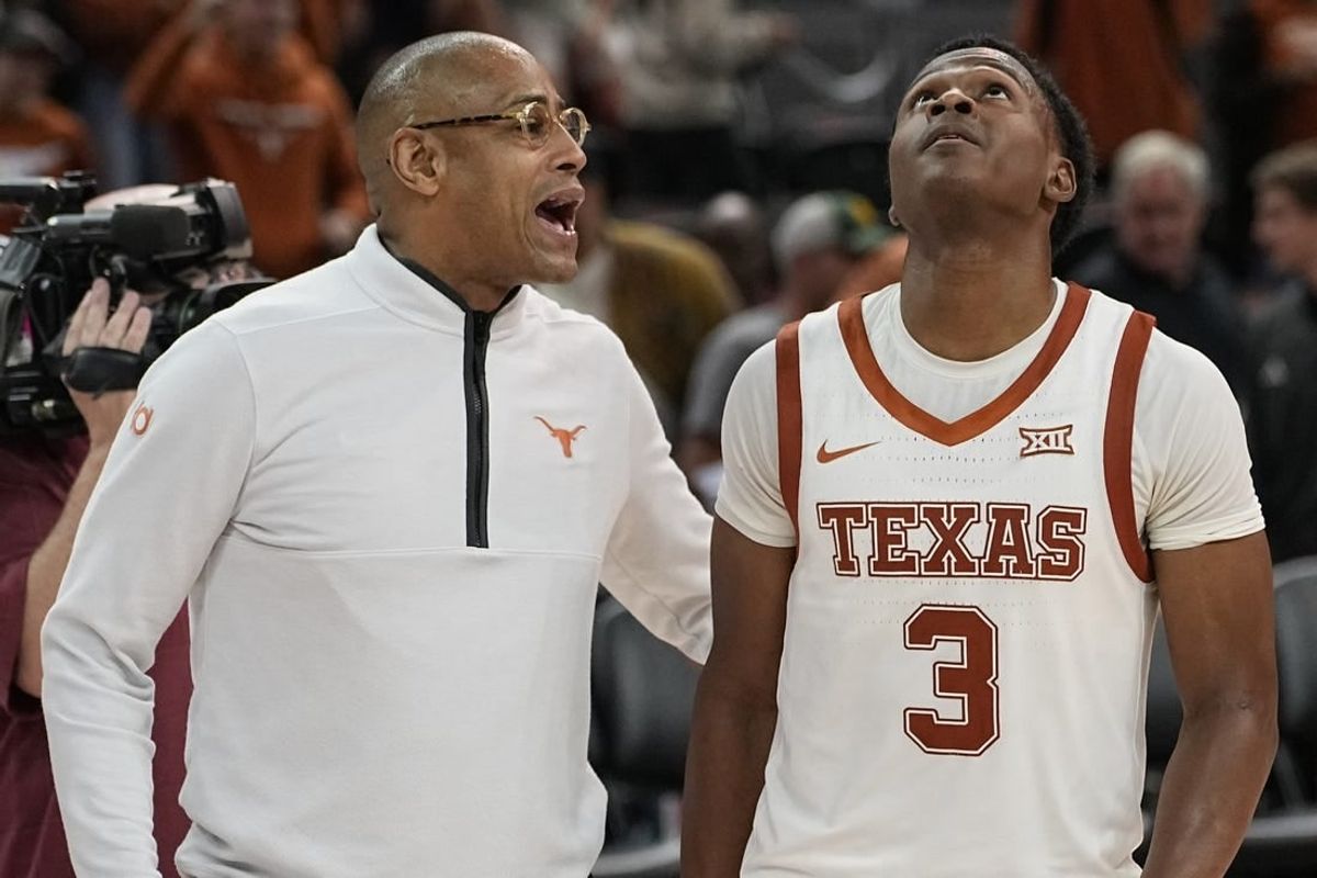 Nov 30, 2023; Austin, Texas, USA; Texas Longhorns head coach Rodney Terry talks with guard Max Abmas (3) after a victory over the Texas State Bobcats at Moody Center.